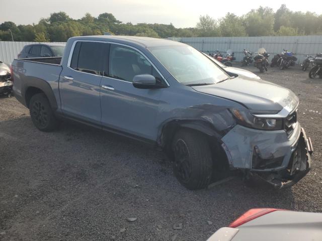 Photo 4 from auction – 2022 HONDA RIDGELINE with VIN 5FPYK3F79NB031718