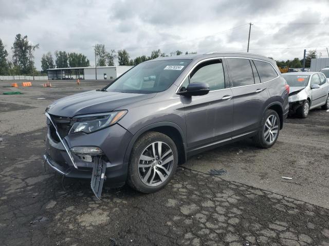 Photo 1 from auction – 2017 HONDA PILOT TOUR with VIN 5FNYF6H90HB087323