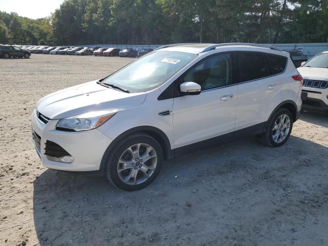 FORD ESCAPE TIT 2016 with VIN 1FMCU0JX9GUA90289 - Photo from auction