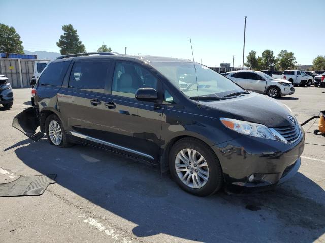 Photo 4 from auction – 2014 TOYOTA SIENNA XLE with VIN 5TDYK3DC2ES524810