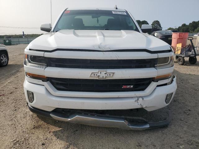 Photo 5 from auction – 2018 CHEVROLET SILVERADO with VIN 3GCUKREC3JG100173