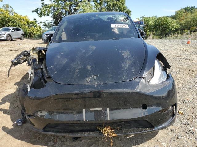 Photo 5 from auction – 2023 TESLA MODEL Y with VIN 7SAYGDEE4PF691672