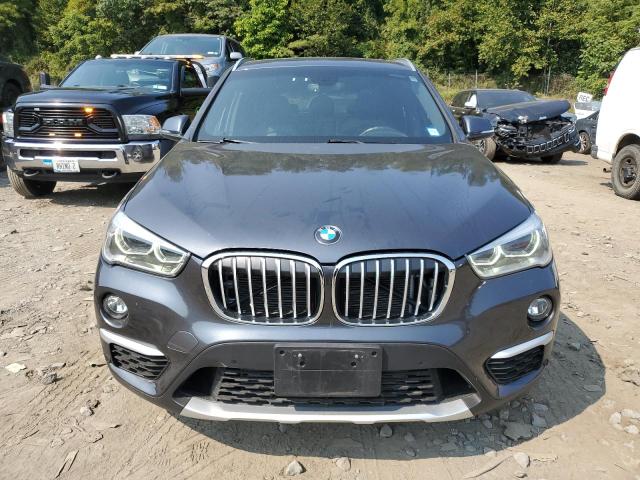Photo 5 from auction – 2017 BMW X1 XDRIVE2 with VIN WBXHT3C30H5F69548