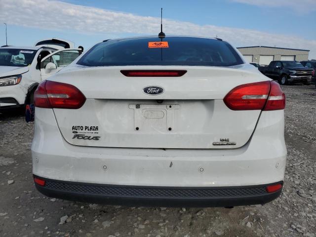 Photo 6 from auction – 2016 FORD FOCUS SE with VIN 1FADP3F28GL311858