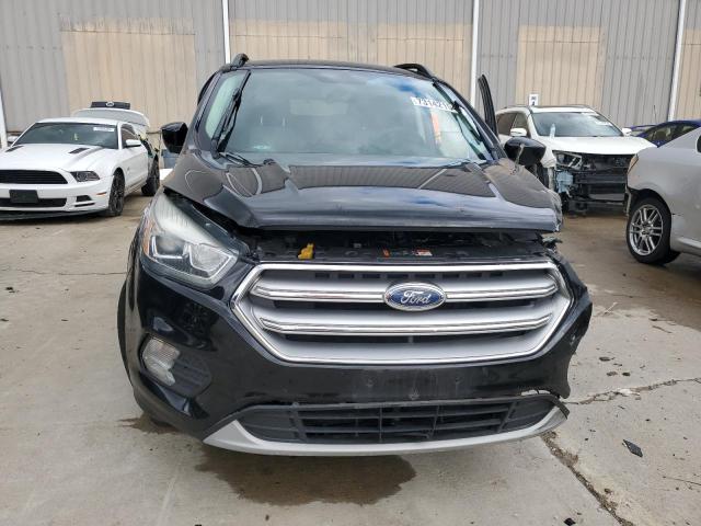 Photo 5 from auction – 2017 FORD ESCAPE SE with VIN 1FMCU9GD8HUC63108