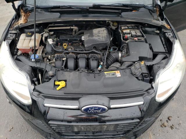 Photo 11 from auction – 2014 FORD FOCUS SE with VIN 1FADP3F22EL218833