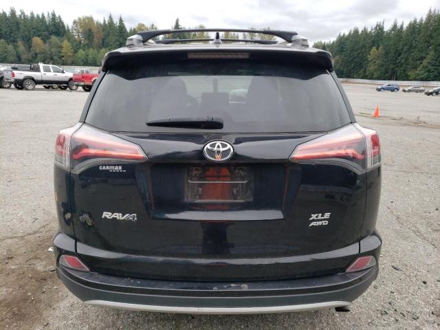 Photo 6 from auction – 2016 TOYOTA RAV4 XLE with VIN 2T3RFREV0GW437260