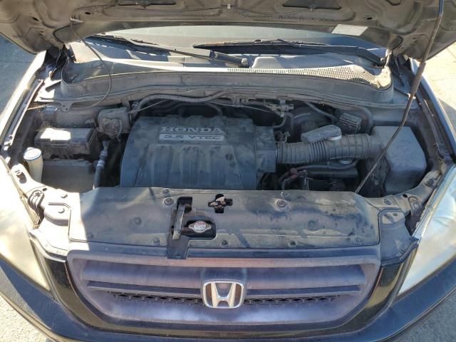 Photo 11 from auction – 2005 HONDA PILOT with VIN 2HKYF18555H563384