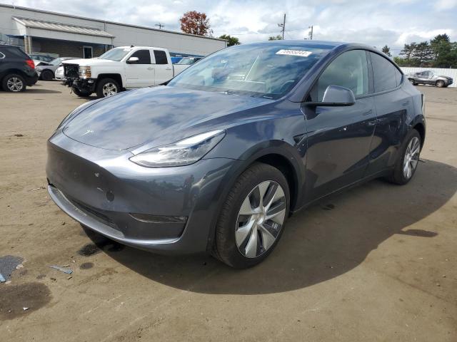 TESLA MODEL Y 2023 with VIN 7SAYGDED3PF931575 - Photo from auction