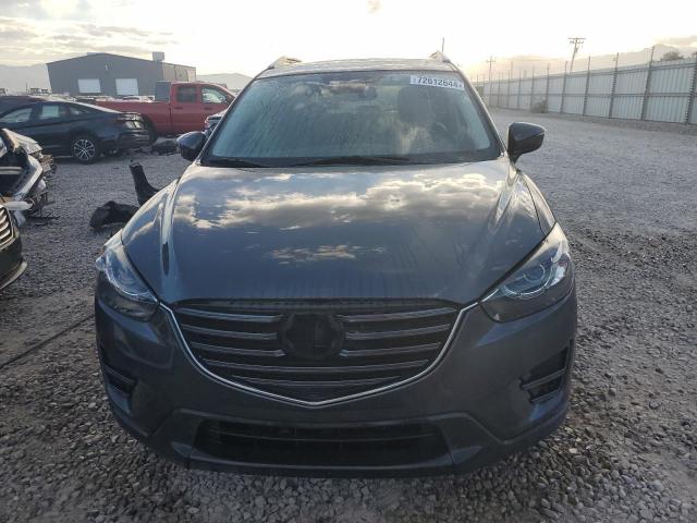 Photo 5 from auction – 2016 MAZDA CX-5 GT with VIN JM3KE2DY2G0842331