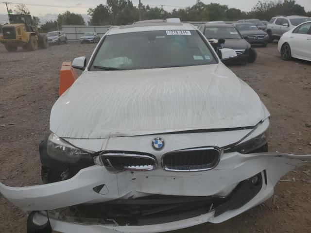 Photo 5 from auction – 2014 BMW 320 I XDRI with VIN WBA3C3G56ENS71014