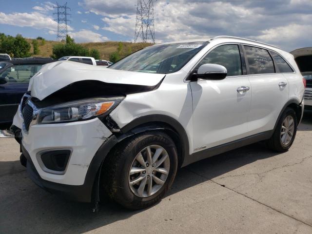 KIA SORENTO LX 2016 with VIN 5XYPGDA54GG160768 - Photo from auction
