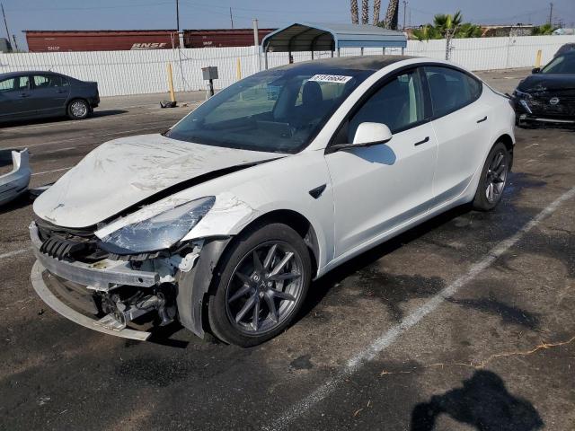 TESLA MODEL 3 2022 with VIN 5YJ3E1EB9NF173779 - Photo from auction