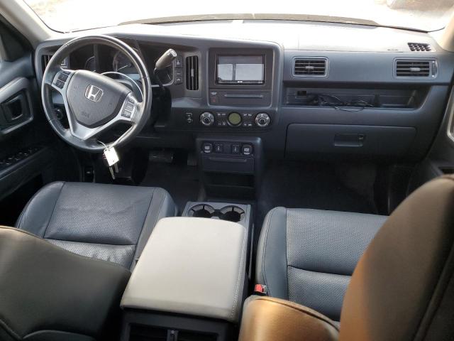 Photo 8 from auction – 2010 HONDA RIDGELINE with VIN 5FPYK1F52AB008326