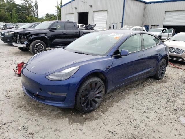 TESLA MODEL 3 2023 with VIN 5YJ3E1EC4PF560932 - Photo from auction