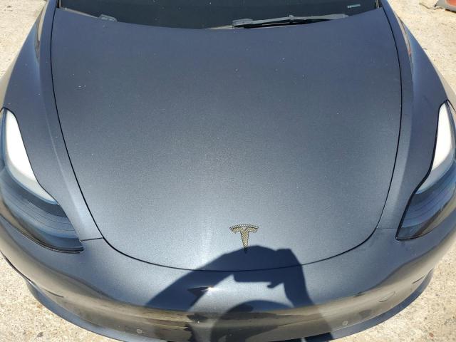 Photo 11 from auction – 2022 TESLA MODEL 3 with VIN 5YJ3E1EB4NF286264