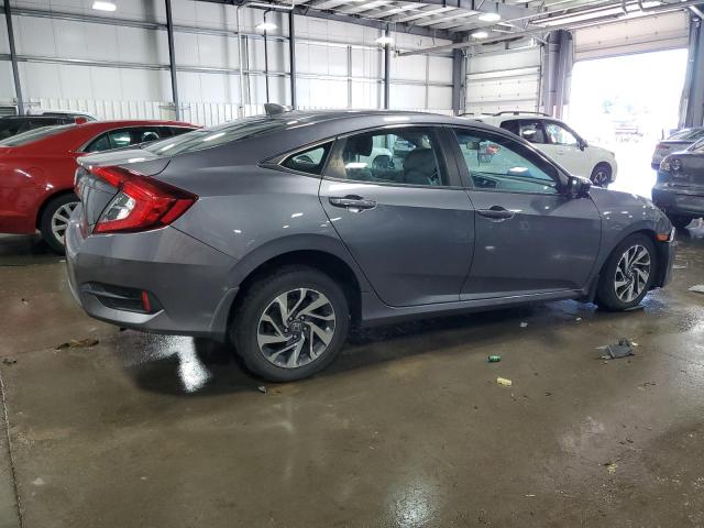 Photo 3 from auction – 2018 HONDA CIVIC EX with VIN 19XFC2F78JE022368