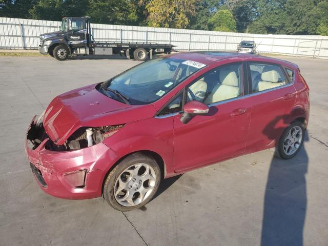 FORD FIESTA SES 2011 with VIN 3FADP4FJ7BM161696 - Photo from auction