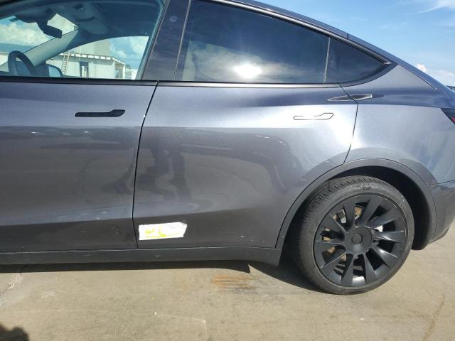 Photo 12 from auction – 2023 TESLA MODEL Y with VIN 7SAYGAEE4PF907437