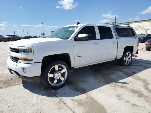 CHEVROLET SILVERADO 2018 with VIN 3GCUKREC5JG138360 - Photo from auction