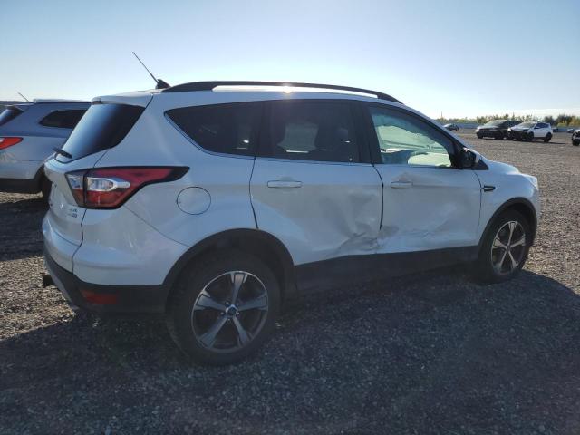 Photo 3 from auction – 2018 FORD ESCAPE SEL with VIN 1FMCU9HD1JUD10029