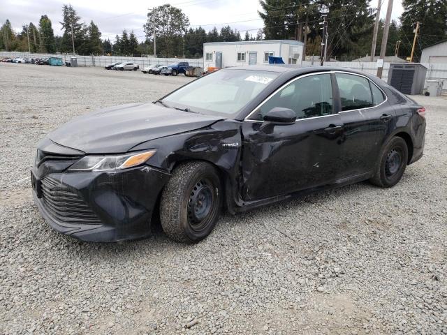 TOYOTA CAMRY LE 2020 with VIN 4T1C31AK3LU520695 - Photo from auction
