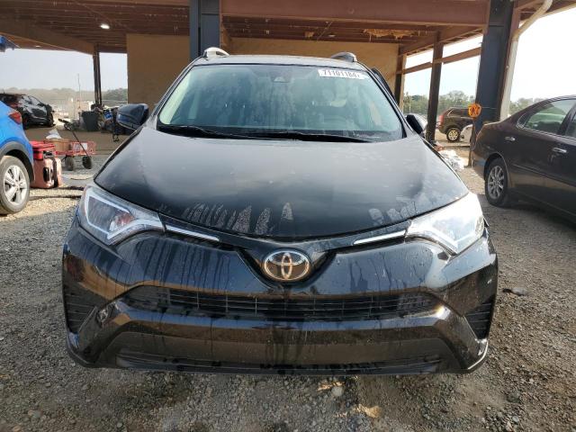 Photo 5 from auction – 2018 TOYOTA RAV4 LE with VIN 2T3ZFREV0JW444054
