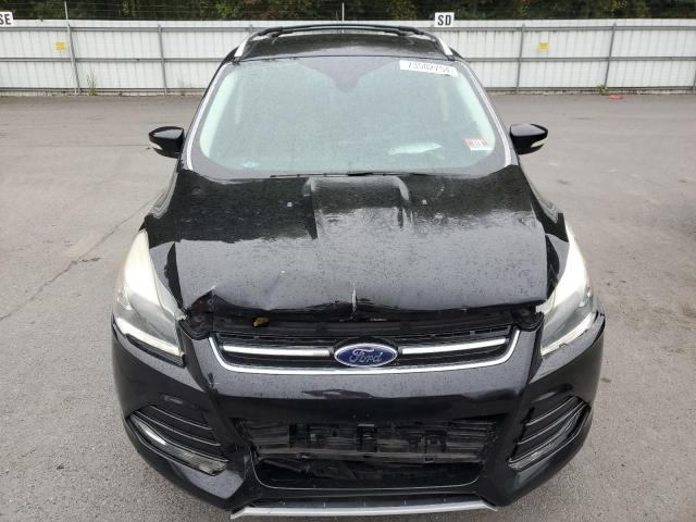 Photo 5 from auction – 2016 FORD ESCAPE TIT with VIN 1FMCU9J97GUB29354