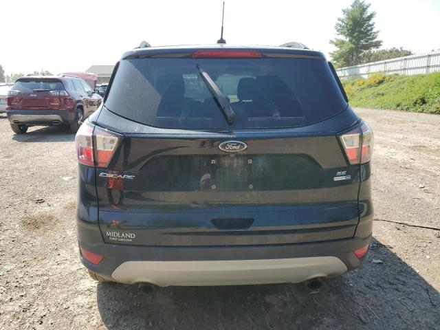 Photo 6 from auction – 2018 FORD ESCAPE SE with VIN 1FMCU9GD8JUC33600
