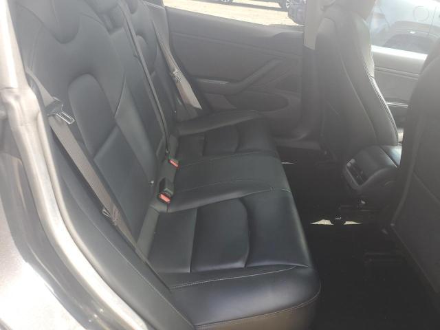 Photo 10 from auction – 2018 TESLA MODEL 3 with VIN 5YJ3E1EA0JF032052