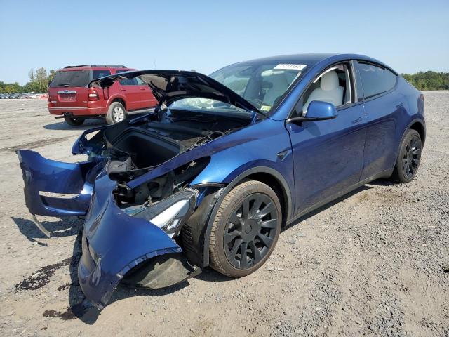 TESLA MODEL Y 2023 con VIN 7SAYGDEE2PA142940 - Foto de la subasta