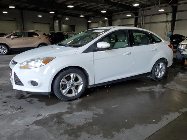 FORD FOCUS SE 2014 with VIN 1FADP3F29EL138610 - Photo from auction