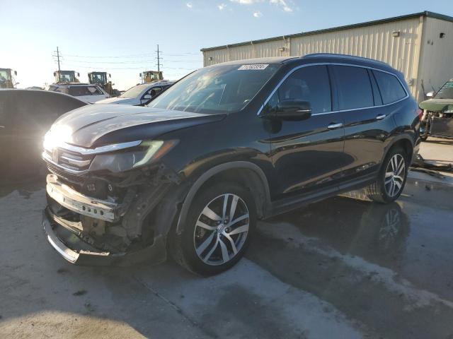 HONDA PILOT ELIT 2016 with VIN 5FNYF6H05GB028087 - Photo from auction