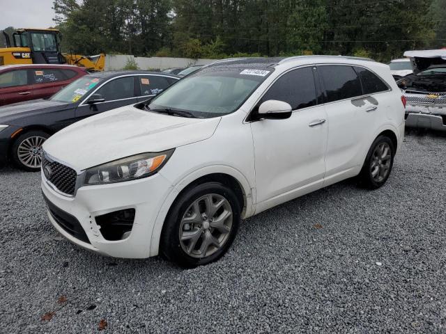 KIA SORENTO SX 2016 with VIN 5XYPK4A53GG018023 - Photo from auction