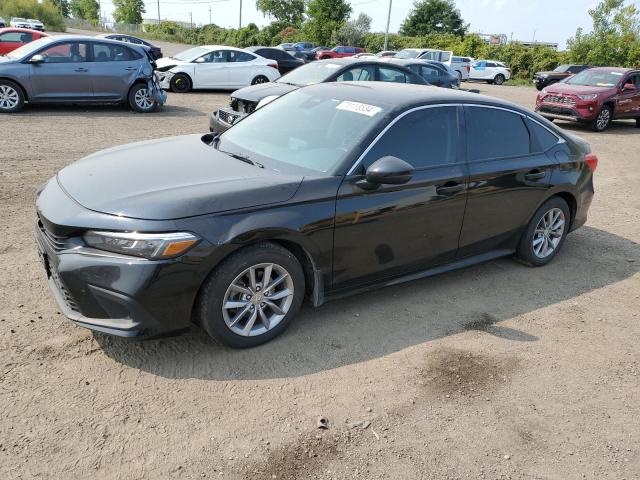 HONDA CIVIC EX 2023 with VIN 2HGFE2F36PH110129 - Photo from auction
