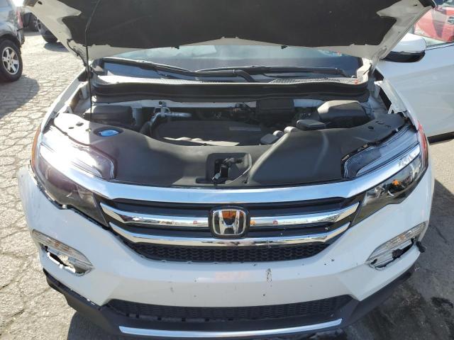 Photo 12 from auction – 2017 HONDA PILOT ELIT with VIN 5FNYF6H04HB067271