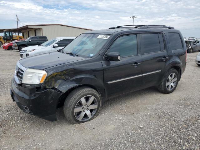 HONDA PILOT TOUR 2014 with VIN 5FNYF4H95EB003027 - Photo from auction