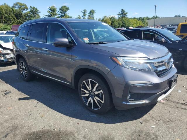 Photo 4 from auction – 2021 HONDA PILOT TOUR with VIN 5FNYF6H63MB005018
