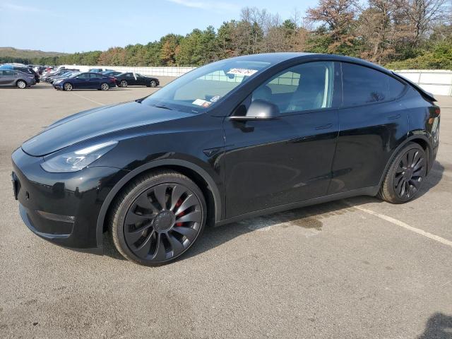 TESLA MODEL Y 2023 с VIN 7SAYGDEF3PF921470 - Фото с аукциона
