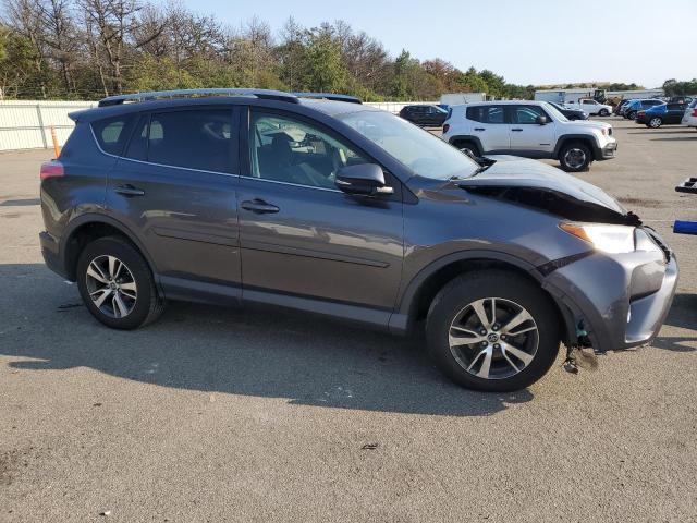 Photo 4 from auction – 2017 TOYOTA RAV4 XLE with VIN JTMRFREV8HJ133237