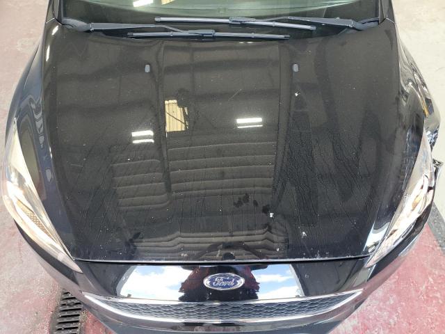 Photo 11 from auction – 2016 FORD FOCUS SE with VIN 1FADP3F27GL394280