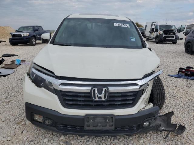Photo 5 from auction – 2019 HONDA RIDGELINE with VIN 5FPYK3F67KB001720