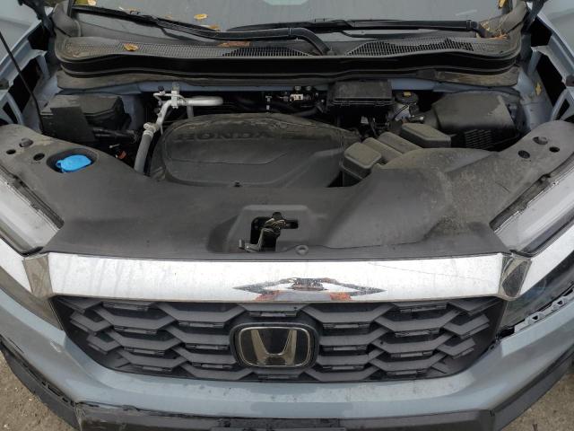 Photo 12 from auction – 2023 HONDA PASSPORT E with VIN 5FNYF8H50PB011656