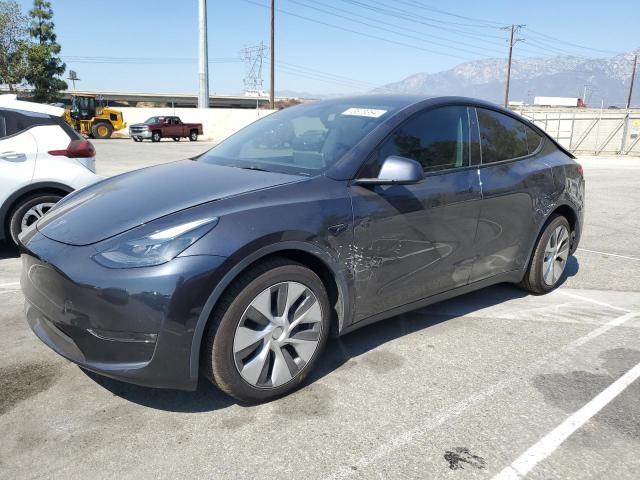 TESLA MODEL Y 2024 with VIN 7SAYGDEE6RF069383 - Photo from auction