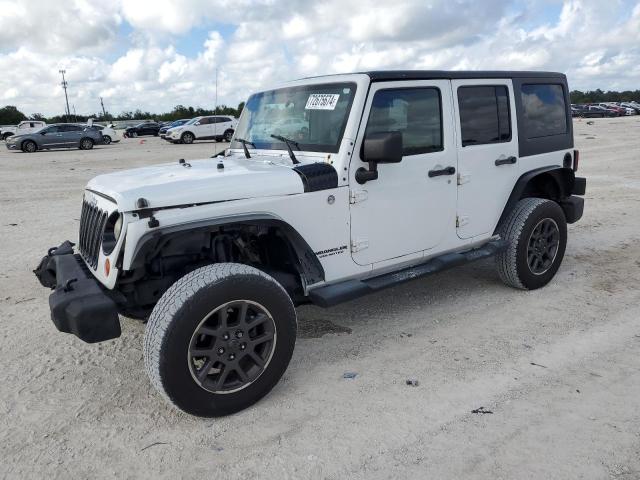 JEEP WRANGLER U 2011 with VIN 1J4BA5H19BL543259 - Photo from auction