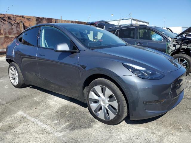 Photo 4 from auction – 2023 TESLA MODEL Y with VIN 7SAYGDED3PF949719