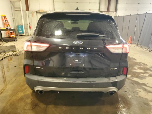Photo 6 from auction – 2021 FORD ESCAPE SEL with VIN 1FMCU9H66MUA65301