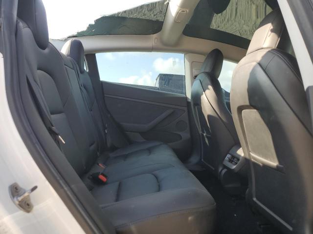 Photo 10 from auction – 2021 TESLA MODEL 3 with VIN 5YJ3E1ECXMF044795