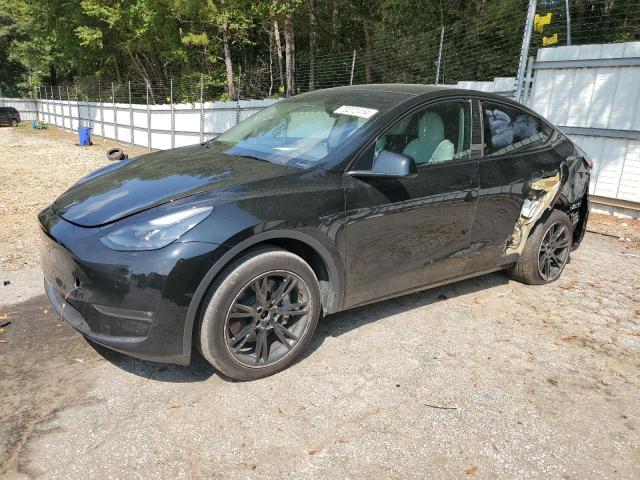 TESLA MODEL Y 2023 with VIN 7SAYGDEE2PF799661 - Photo from auction