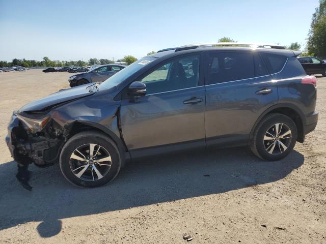 Photo 1 from auction – 2018 TOYOTA RAV4 LE with VIN 2T3ZFREV7JW485779
